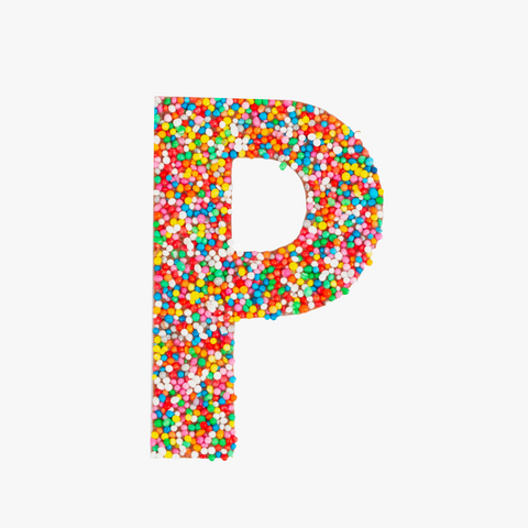 Premium Belgian chocolate letter "P" topped with colourful sprinkles – a fun and tasty treat perfect for personalising any occasion.