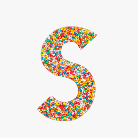Premium Belgian chocolate letter "S" topped with colourful sprinkles – a fun and tasty treat perfect for personalising any occasion.