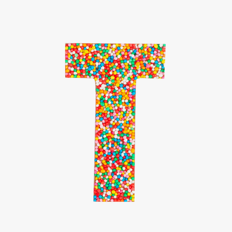 Premium Belgian chocolate letter "T" topped with colourful sprinkles – a fun and tasty treat perfect for personalising any occasion.