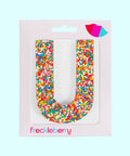Premium Belgian chocolate letter "U" topped with colourful sprinkles – a fun and tasty treat perfect for personalising any occasion.