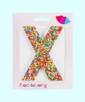 Premium Belgian chocolate letter "X" topped with colourful sprinkles – a fun and tasty treat perfect for personalising any occasion.