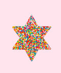 Christmas freckle star, made from premium Belgian chocolate and topped with colourful sprinkles. Perfect for gifting in the holidays and other occasions. 