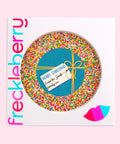 Creamy giant Belgian chocolate (available in 3 variants - dark, milk or white) with colourful sprinkles, customised with a festive blue present design for holiday gifting.