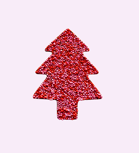 Christmas freckle tree, made from premium Belgian chocolate and topped with red & pink sprinkles. Finished with a festive Merry Christmas design – perfect for gifting or sharing.