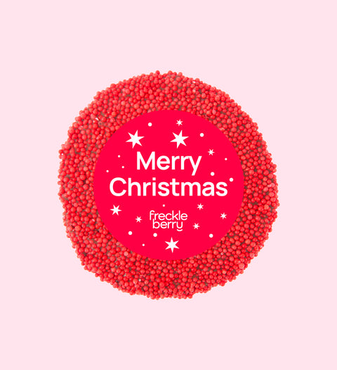 Premium Belgian chocolate topped with bright red sprinkles, wrapped in a festive Merry Christmas design – perfect for gifting or stocking fillers.