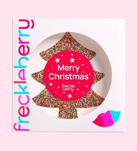 Creamy Belgian chocolate tree (available in 3 variants - dark, milk or white) covered in colourful sprinkles with "Merry Christmas - Stars" design/label, a festive treat for holiday gifting and celebrations.