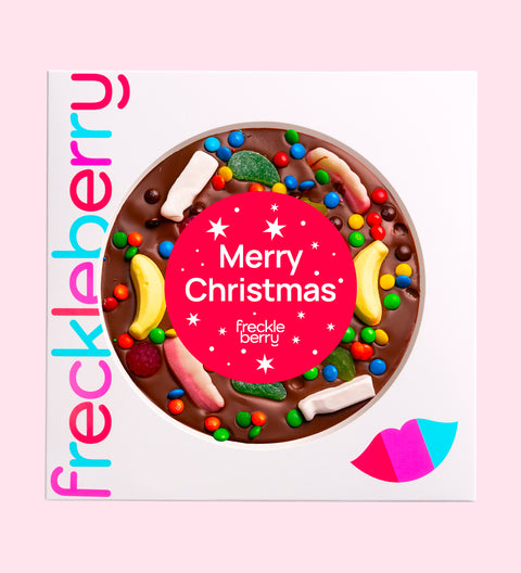 Festive Belgian chocolate pizza (available in 3 variants - dark, milk or white) loaded with colourful lollies with "Merry Christmas - Stars" label/design, perfect for sharing and holiday celebrations.