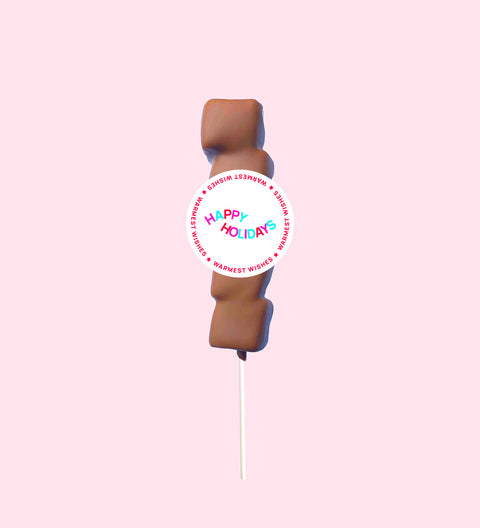 Fluffy marshmallow coated in premium Belgian chocolate with Happy Holidays sticker/label – a fun and festive treat for the holiday season.