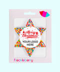 Premium Belgian chocolate star topped with colourful sprinkles with Merry Christmas design/label and can be customised - a fun and delicious treat for the holiday season.