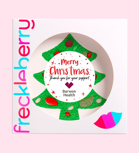 Premium Belgian milk chocolate tree topped with colourful lollies and vibrant green sprinkles, customised with Merry Christmas text and your logo for a festive gift.