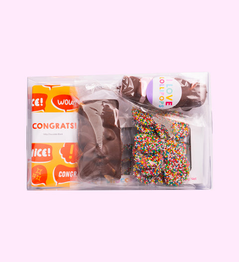 Congratulations Gift Box, filled with a selection of premium Belgian chocolate treats – the perfect way to say well done. Inclusions:

Milk Chocolate Message Block
Milk Rocky Road
150g Milk Chocolate Freckle Grab Bag
Marshmallow Pop
Freckle Word “Star”