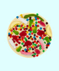 Premium Belgian white  chocolate pizza loaded with lollies perfect for gifting.