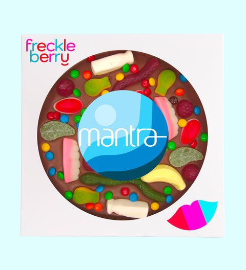 Premium Belgian chocolate pizza (available in 3 variants - dark, milk or white) loaded with lollies, customised with your logo or graphic upload for impactful corporate gifting.