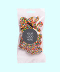 Sweet treat bags filled with delicious milk chocolate heart freckles and customised with your logo or graphic upload for memorable corporate gifting.