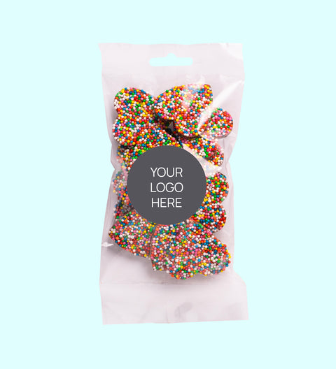 Sweet treat bags filled with delicious milk chocolate heart freckles and customised with your logo or graphic upload for memorable corporate gifting.