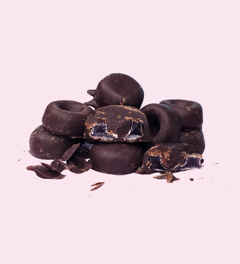Aromatic aniseed rings coated in rich Belgian dark chocolate for a nostalgic, indulgent treat.