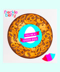 Belgian milk chocolate pizza loaded with pretzels, choc chip cookies, caramel fudge, and salted cashews with Happy Easter - You're a Good Egg sticker, the perfect festive treat to celebrate Easter.