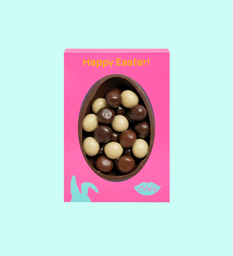 Half Easter egg filled with white, milk and dark chocolate-coated raspberries - a rich, fruity and elegant Easter treat made for gifting and sharing.