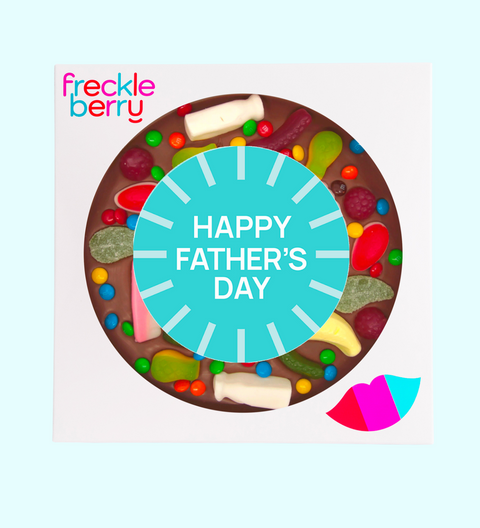 Festive chocolate gift with colorful candies and 'Happy Father's Day' text, branded 'freckleberry'.