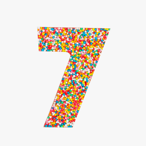 Premium Belgian chocolate number "7" topped with colourful sprinkles – a fun and delicious treat for any occasion.