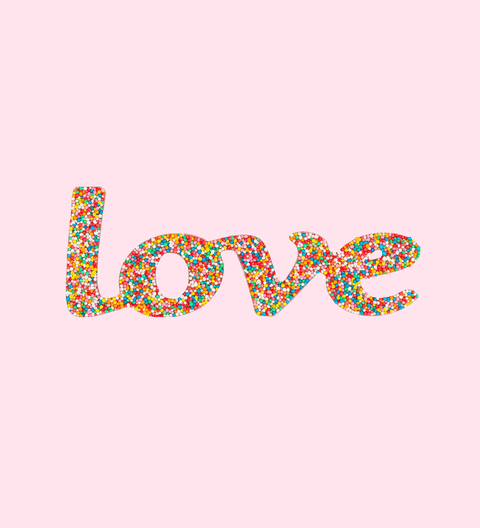 Premium Belgian milk chocolate word "Love" topped with colourful sprinkles – a sweet and heartfelt treat.