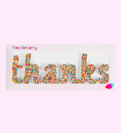 Premium Belgian milk chocolate word "Thanks" topped with colourful sprinkles – a sweet and thoughtful treat.