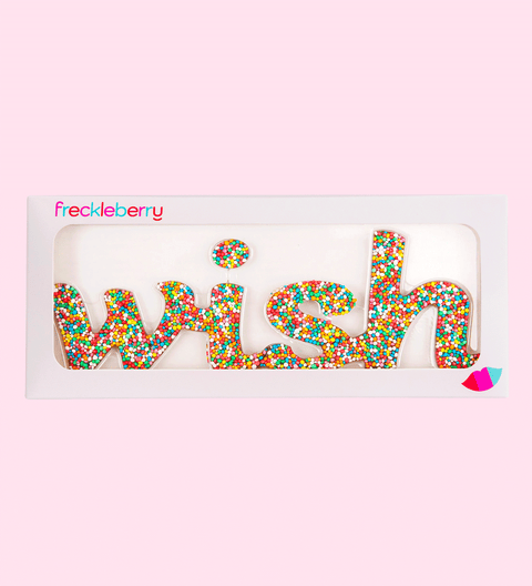 Premium Belgian milk chocolate word Wish, topped with colourful sprinkles – a fun and delicious treat for any occasion.