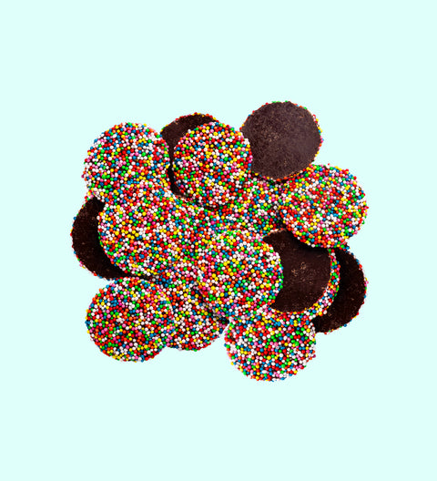 Rich dark chocolate freckles, made from premium Belgian chocolate and topped with colourful sprinkles. A perfect festive treat for gifting or sharing.