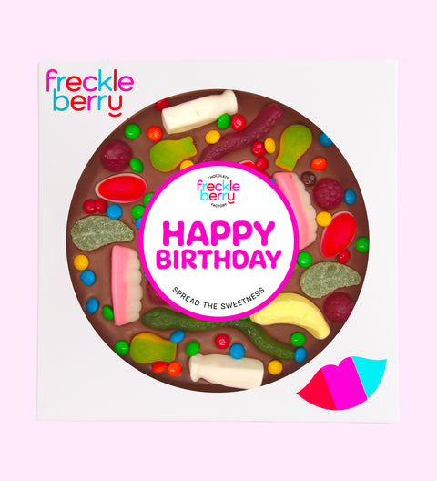 Giant Belgian milk chocolate pizza loaded with colourful lollies, the perfect festive treat to celebrate birthdays.