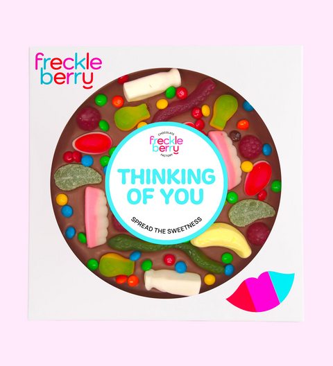 Premium giant Belgian chocolate (available in 3 variants - dark, milk of white) pizza with colourful lollies and M&M®s labeled with "Thinking of You" sticker/design. 
