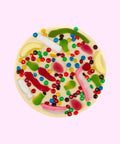Premium Belgian white chocolate pizza topped with colourful lollies, can be customised with your uploaded image for a fun and unique gift.