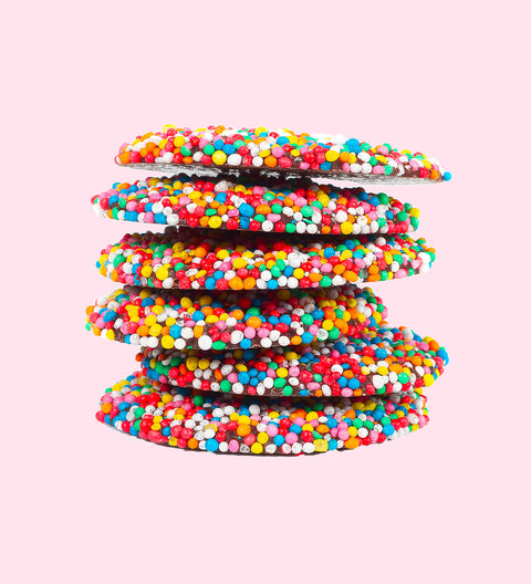 Rich dark chocolate freckles, topped with colourful sprinkles. Made from premium Belgian chocolate and perfect for a sweet and thoughtful Valentine’s Day gift.