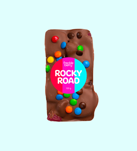 Fun Rocky Road bursting with marshmallows, nuts, and colourful candies, all coated in smooth premium Belgian milk chocolate – a playful and delicious treat.