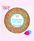 Freckle Berry product with colorful sprinkles and 'Thinking of You' text on a white background