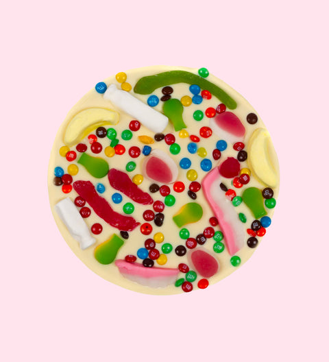Premium giant Belgian whitte chocolate pizza loaded with colourful lollies -  the perfect fun and festive gift for all occasions or just because.