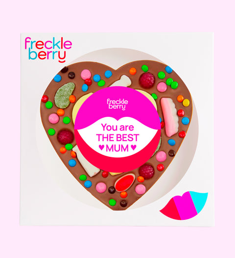 Giant Belgian milk chocolate heart topped with colourful lollies with You are the Best Mum sticker, a fun and thoughtful gift for Mum.