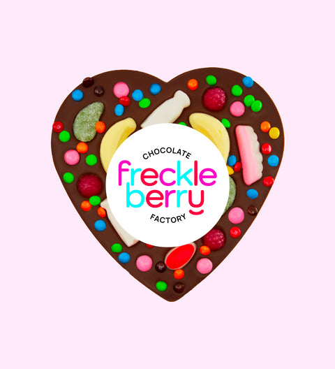 Premium Belgian dark chocolate heart pizza loaded with colourful lollies, perfect for sharing, gifting, or celebrating any occasion.