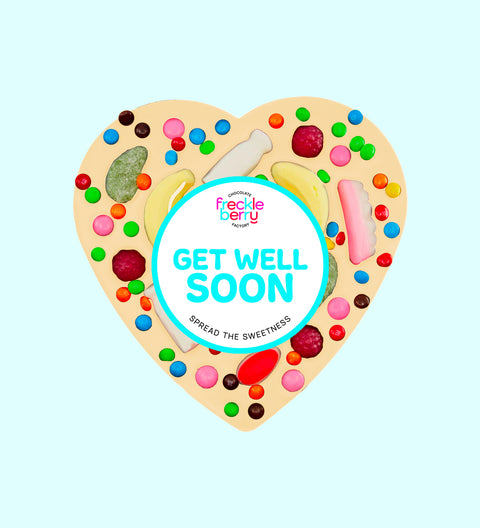 Giant Belgian white chocolate heart pizza loaded with colourful lollies and M&M®s - a sweet and cheerful gift to brighten someone’s day wishing them to get well soon.