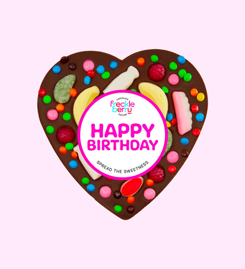 Giant heart-shaped Belgian dark chocolate pizza loaded with colourful lollies, the perfect festive treat to celebrate birthdays.