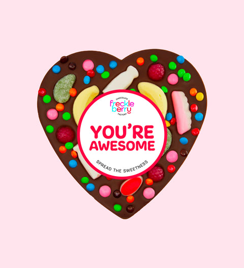 Premium Belgian dark chocolate heart pizza loaded with colourful lollies with "You're Awesome" design/label, a fun and sweet way to celebrate someone special.
