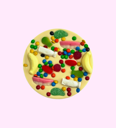 Fun, shareable Belgian white chocolate  pizza topped with lollies, can be personalised with your design for a unique favour.