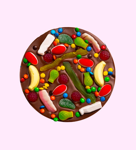 Giant Belgian milk chocolate pizza loaded with colourful lollies, a fun and sweet way to say thanks in any special occasion.