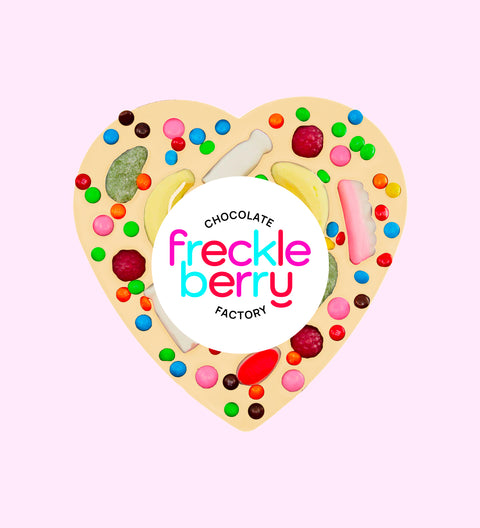 Belgian white chocolate heart pizza loaded with colourful lollies, perfect for sharing, gifting, or celebrating any occasion.