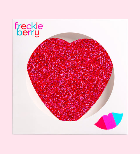 Premium giant Belgian chocolate heart (avaialble in 3 variants - dark, milk and white) topped with vibrant red and pink sprinkles for the perfect romantic treat.