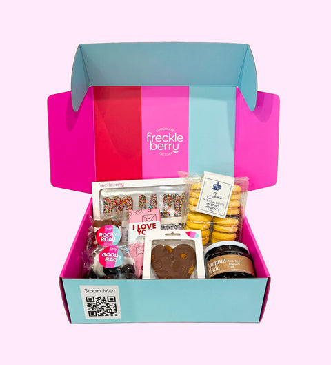 An indulgent selection of premium Belgian chocolates, cookies and jam - the perfect gift to spoil Mum on her special day.

1 × Luxury coloured hamper
1 × Happy Mother’s Day sticker (on outer packaging; options may vary)
1 × Dark Freeze-Dried Strawberries
1 × Gourmet Heart Chocolate
1 × Belgian Chocolate Block I love You
1 × Turkish Delight Rocky Road
1 x Dark Caramel, raspberry, marshmallow, cashew nut rocky road
1 × MUM word
1 × Bag Jen's Cookies
1 x Mumma Made Jam