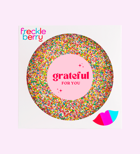 Colorful circular product with 'grateful for you' chocolate freckle
