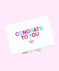 White hamper box with "Congrats to You" personalised messge to express congratulations to your loved ones. 