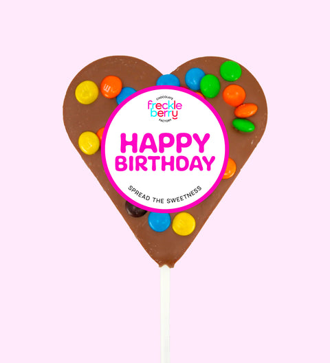 Belgian milk chocolate heart topped with colourful M&M®s, a sweet and fun way to celebrate a birthday.