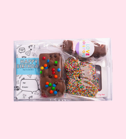 Happy Birthday Gift Box, filled with premium Belgian chocolate treats – a sweet and delicious birthday surprise. Inclusions:

100g Milk Chocolate Message Block
150g Fun Rocky Road
150g Milk Chocolate Freckles Grab Bag
60g Marshmallow Pop
60g Chocolate “Wish” Word