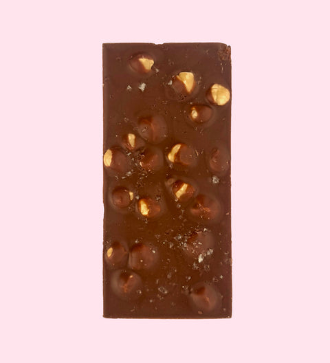 Premium Belgian milk chocolate with crunchy roasted hazelnuts, rich caramel, and a touch of sea salt for the perfect sweet-salty treat. Perfect for any occasion.